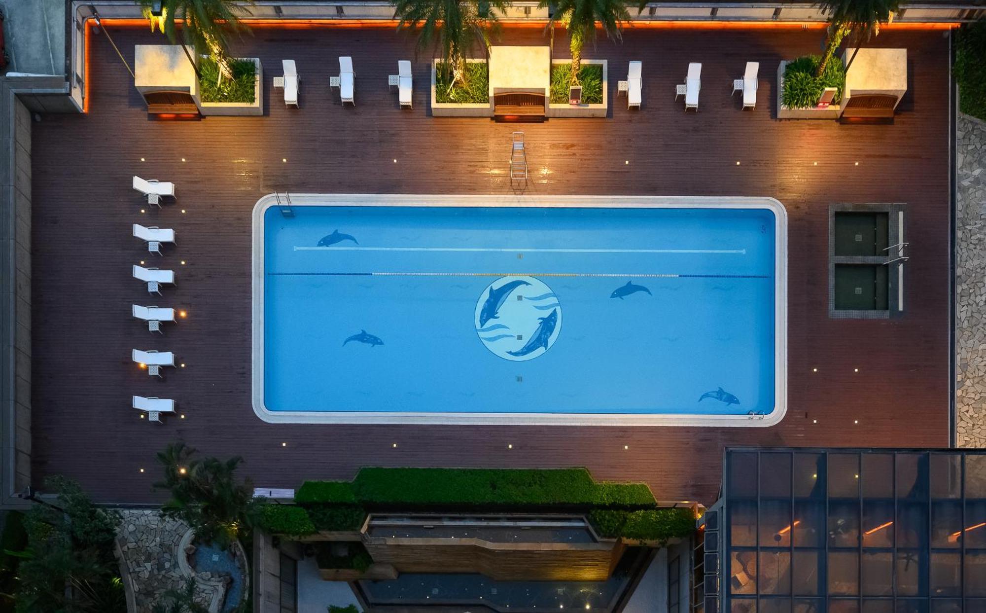 Evergreen Resort Hotel - Jiaosi Jiaoxi Buitenkant foto The pool at the Dolphinarium